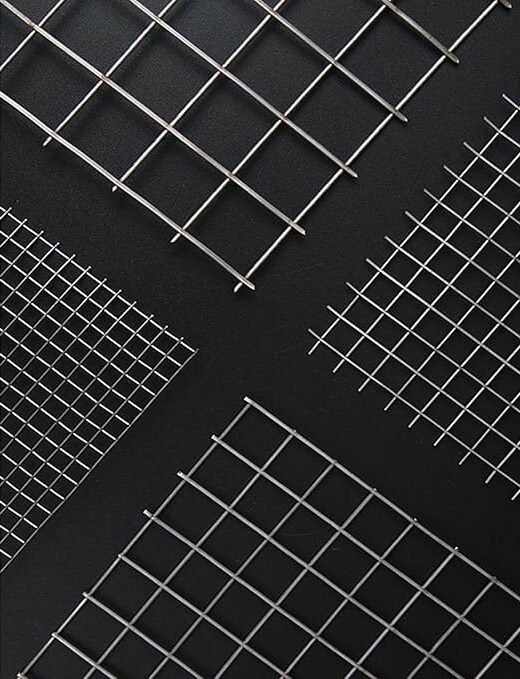 Various fencing products including chainlink fence, barbed wire, and mesh panels